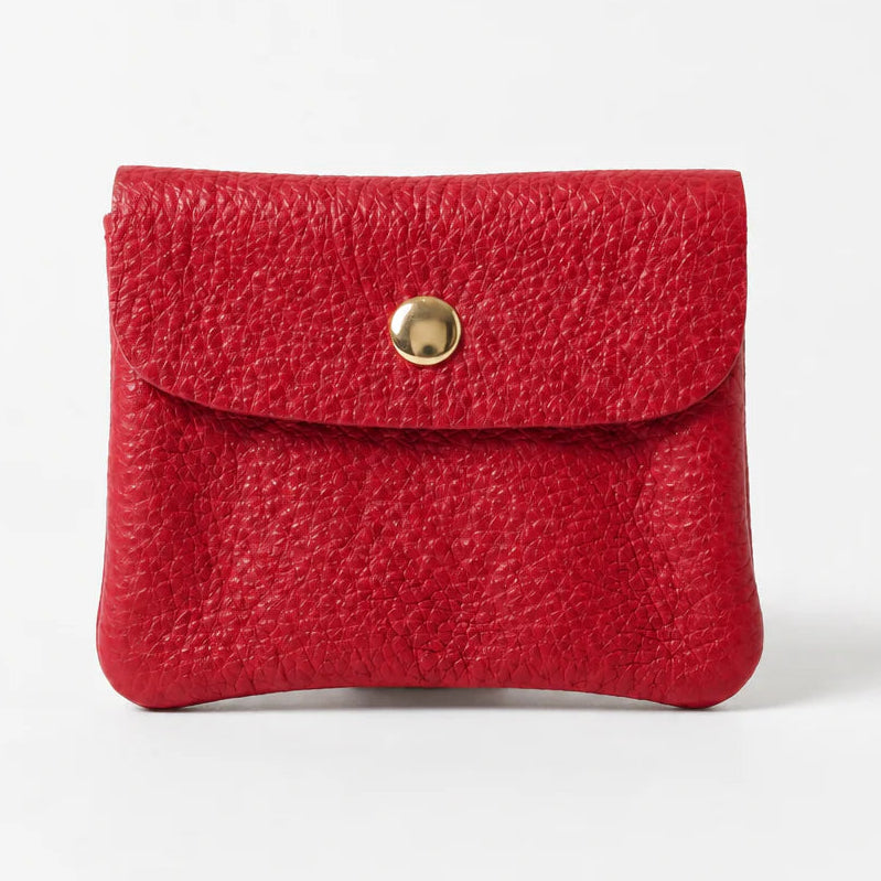 Red textured wallet with a gold button on a white background
